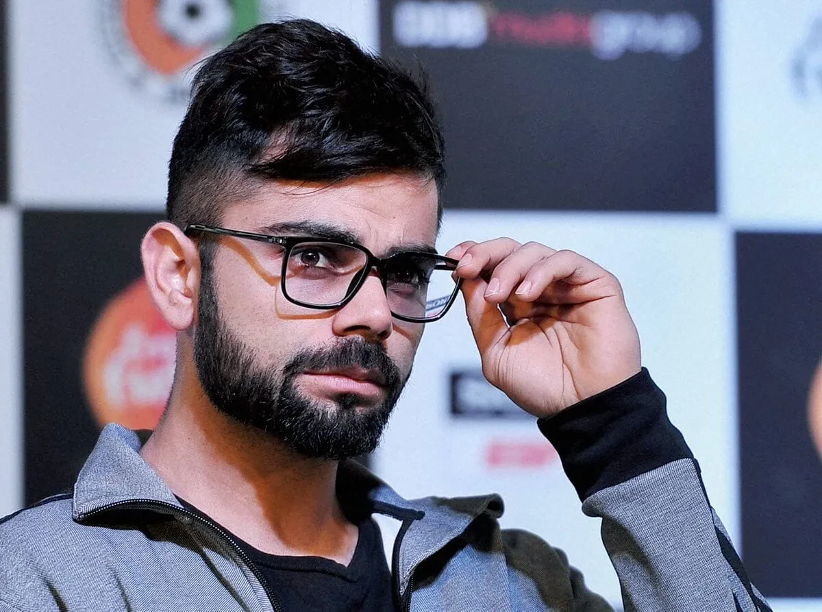 img/2116_virat-kohlis-hair-and-beard-style-in-2024-a-look-back.webp