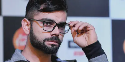 img/2116_virat-kohlis-hair-and-beard-style-in-2024-a-look-back.webp